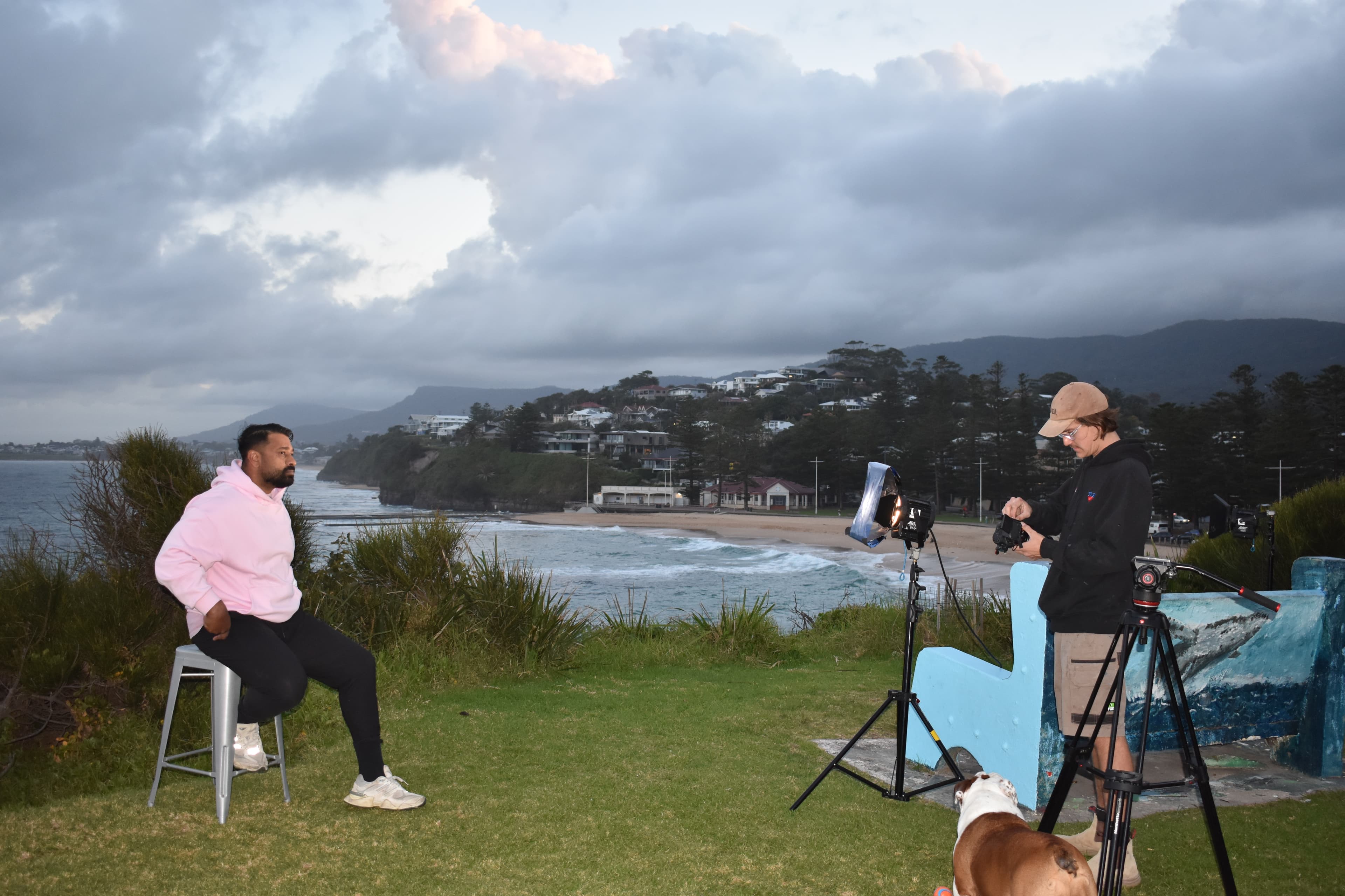Denim Budai filming an interview on the Illawarra coastline